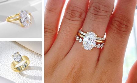 A close-up of a Taylor Swift inspired gold-plated ring with an oval-cut CZ stone being worn.