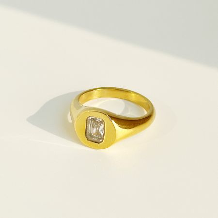 Close-up view of the signet ring with a brilliant clear square CZ stone.