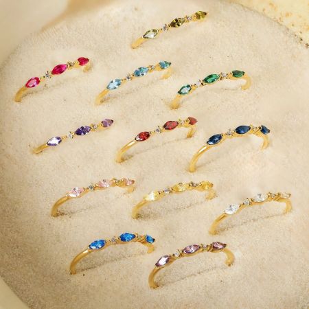 925 Sterling Silver Birthstone Ring for Women Marquise and Round Gemstones Set of 5 - A stunning set of five stackable 925 sterling silver birthstone rings with gold plating, featuring an array of colorful marquise and round CZ gemstones.