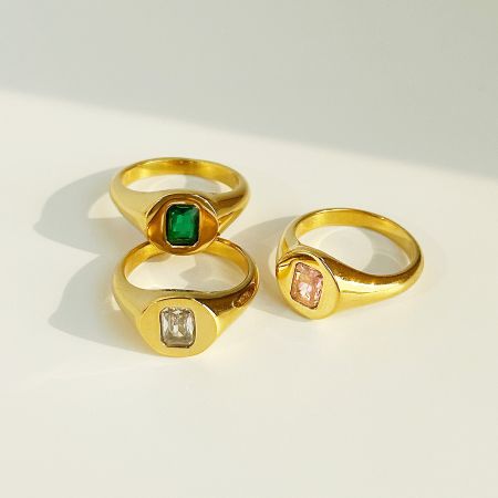 Stainless Steel Square CZ Stone Signet Rings (Set of 5) - A set of three gold-plated stainless steel signet rings, each featuring a square-cut CZ stone in green, clear, and pink.