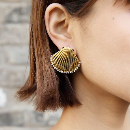 Stainless Steel Waterproof Beach Jewelry Gold CZ Stone Scallop Shell Stud Earrings (5 Pairs) - A model wearing the gold-tone stainless steel scallop shell stud earring, showcasing its elegant design and sparkling CZ stones.