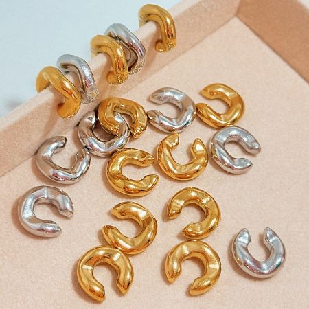 Variety of C-shaped stainless steel ear cuffs available in 18K gold and silver plating.