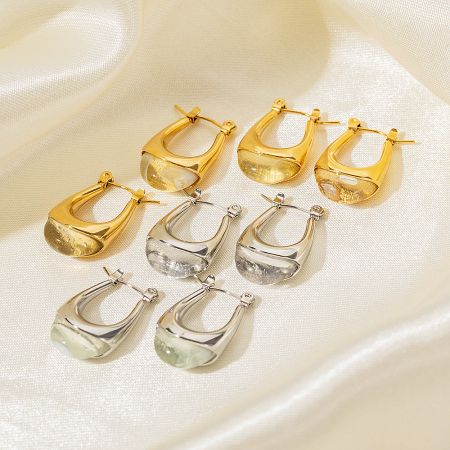 An assortment of stainless steel U-shape hoop earrings in both gold and silver finishes.