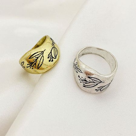 Side-by-side view of the gold and silver floral engraved brass rings.