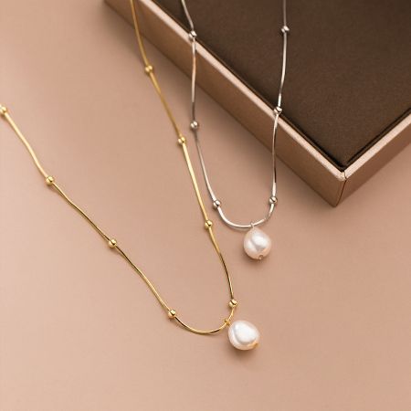 925 Sterling Silver Vintage Baroque Pearl Necklace Set - A set of 925 sterling silver vintage baroque pearl necklaces, showcasing both the elegant gold and classic silver finish options side-by-side.