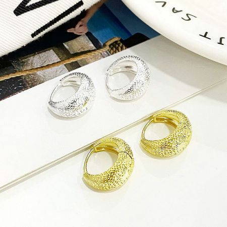 925 Sterling Silver Textured Bag Shape Chunky Hoop Earrings - A pair of gold and a pair of silver 925 sterling silver textured bag-shape chunky hoop earrings displayed side-by-side.