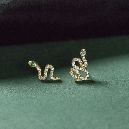 Gold-plated 925 sterling silver snake earrings featuring white and green gemstone details.