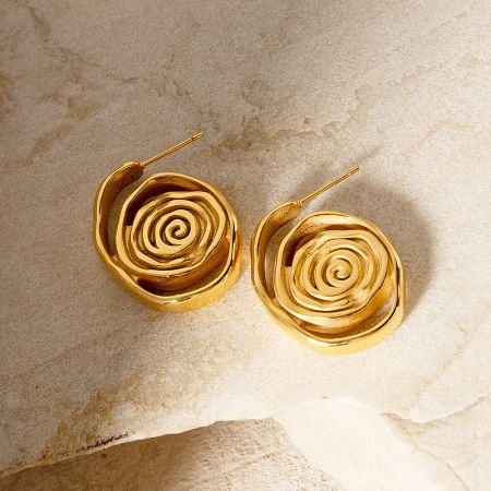 Waterproof Stainless Steel Gold Spiral Stud Earrings (Set of 5 Pairs) - A pair of waterproof gold-plated stainless steel stud earrings with an elegant spiral design, displayed on a white marble surface.