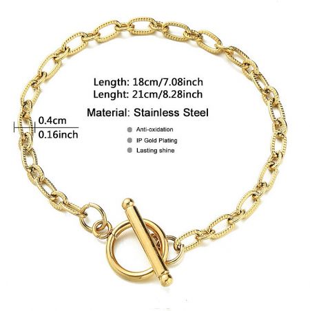 Detailed view of the gold stainless steel toggle bracelet's chain links.