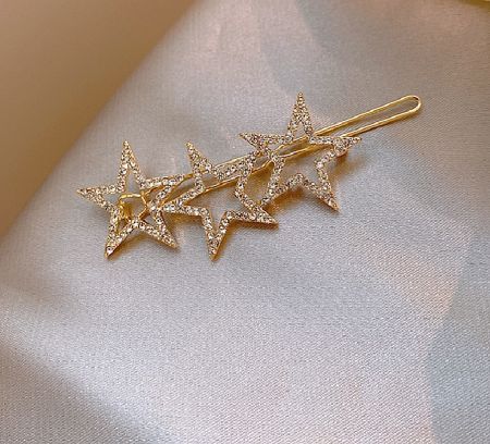 Side profile of the Triple Star Crystal Bobby Pin showcasing its clip mechanism and crystal settings.