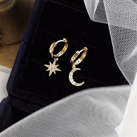 925 Sterling Silver Star & Moon Huggie Hoop Earrings (Set of 5 Pairs) - A set of 925 sterling silver star and moon huggie hoop earrings with gold plating, elegantly displayed in a black jewelry box.