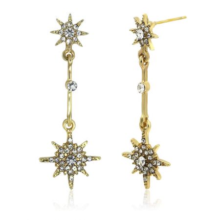 Detailed view of the gold starburst earrings highlighting the clear cubic zirconia gemstones.