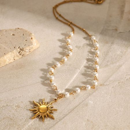 Set of 5 Dainty Gold Sun Pendant Pearl Necklaces in Waterproof Stainless Steel - Close-up of a dainty gold sun pendant pearl necklace made of waterproof stainless steel, showcasing its delicate design and lustrous finish.