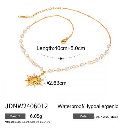 Elegant boho sun necklace with white pearls on a gold-plated stainless steel chain, ideal for layering.