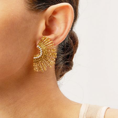 Stainless Steel Waterproof Large Sunflower CZ Stone Stud Earrings - Close-up of a woman wearing the gold stainless steel sunflower stud earring, highlighting its intricate design and central CZ stone.