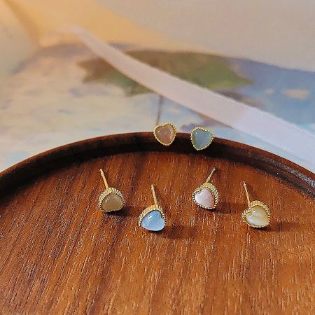 Gold-Plated Mini Opal Glass Heart Stud Earrings (Set of 5 Pairs) - A display card showing sets of gold-plated mini heart stud earrings with pink, blue, and yellow opal glass stones.