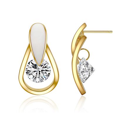 Side view of the gold teardrop-shaped earrings showcasing the clear cubic zirconia gemstones.