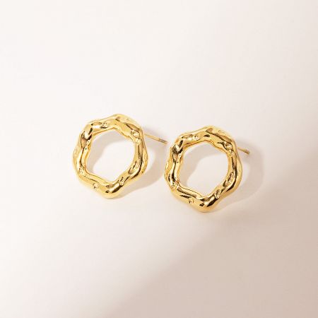 Back view of the gold hollow circle stud earrings, showing the post-back closure.