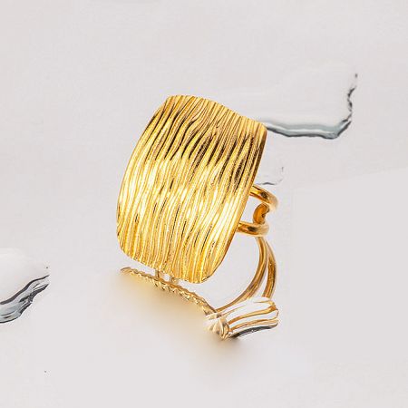 Top-down view of the gold textured ring showcasing its unique surface.