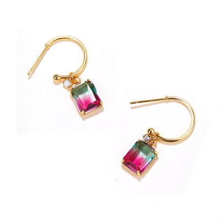 Side profile of the gold tourmaline earrings, showing the secure post fitting and elegant drop design.