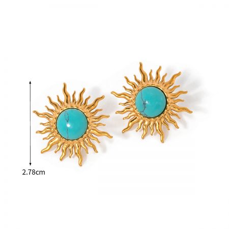 Close-up of a pair of gold sun earrings with a central turquoise stone, showing size dimension.