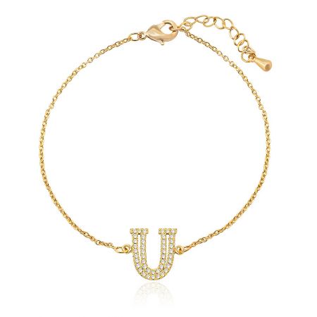 Diamond Alphabet Initial Bracelet - Close-up of the Diamond Alphabet Initial Bracelet in gold, showcasing the U-shaped charm set with brilliant cubic zirconia stones.