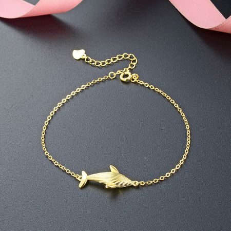 925 Sterling Silver Gold Whale Charm Bracelet Set of 5 - A close-up of the 925 sterling silver gold whale charm bracelet, showcasing the detailed whale pendant on a delicate chain.