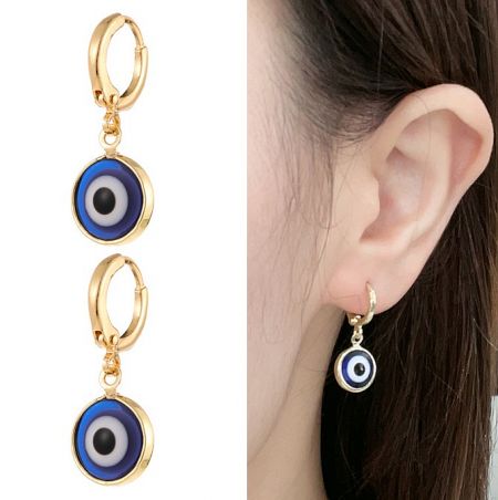 Close-up of the evil eye earring, highlighting the gold finish and multi-color enamel.