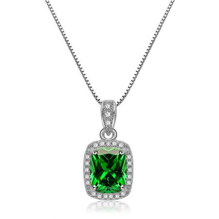Detailed view of the art deco style pendant with its central green gemstone and surrounding white CZ stones.