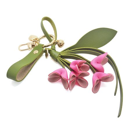 Hot pink PU leather orchid flower bag charm.