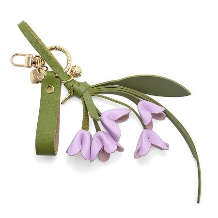 Purple PU leather orchid keychain accessory.