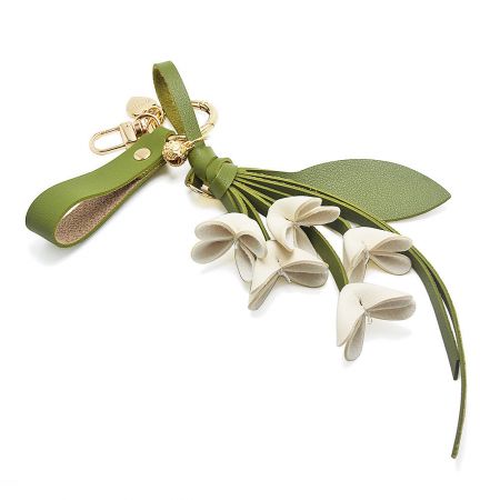 White PU leather orchid flower bag charm.