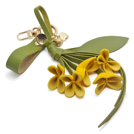 Yellow PU leather orchid flower bag charm.