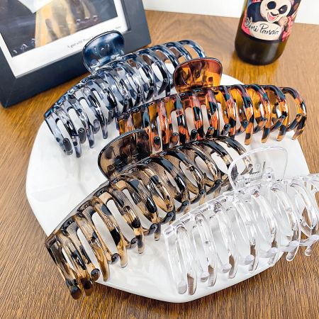 Full set of 5 hair claw clips showcasing all available colors and patterns.