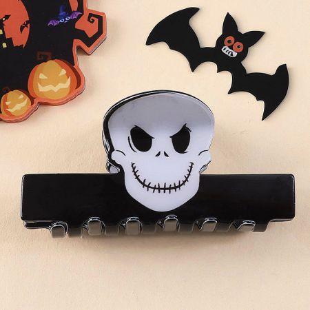 A white skull hair clip perfect for a gothic Halloween look.
