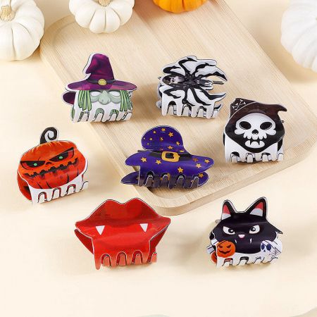 Assortment of Halloween hair clips with spooky and fun designs.