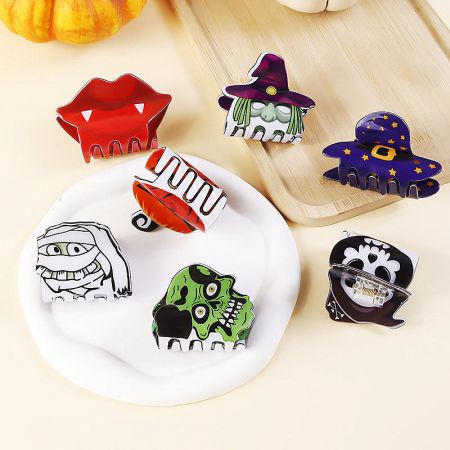 Various monster and character themed Halloween hair clips.