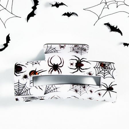 Halloween Claw Clip: Cartoon Pumpkin and Ghost Accessories for Women and Girls (5 pcs) - A collection of festive Halloween-themed claw hair clips, featuring designs like pumpkins, ghosts, and spider webs, displayed on a neutral background.