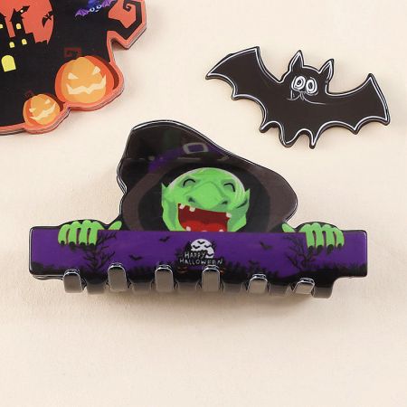A witch-themed hair clip, ideal for Halloween parties.
