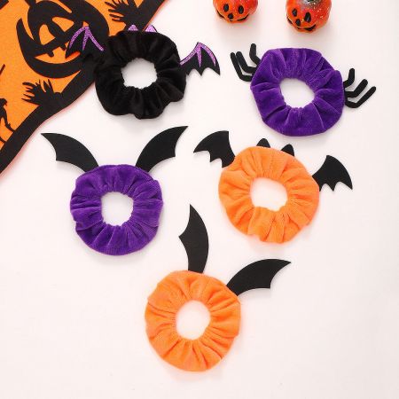 Cute Halloween Hair Scrunchies Bat Spider Style (5 pcs) - A collection of five cute Halloween-themed hair scrunchies, featuring bat wing and spider designs in festive colors like orange, purple, and black.