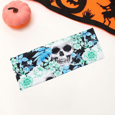 A unique Halloween headband with a floral and skull pattern on a blue background.