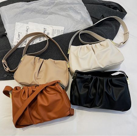 Color options for the retro handbag including brown, beige, cream, and black.