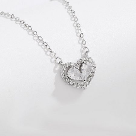 925 Sterling Silver Fashion Jewelry Designer Heart Choker Heart-Shaped Necklace Set of 5 - A close-up of a 925 sterling silver heart-shaped choker necklace with a crystal pendant, part of a set of five.