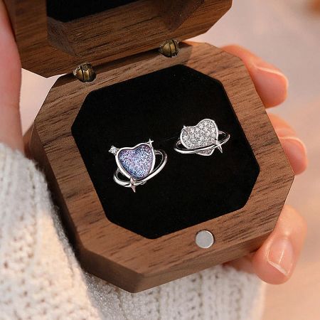 The earring set presented beautifully in a wooden jewelry box.