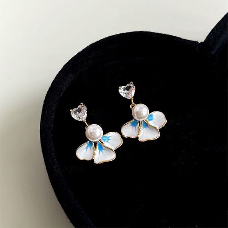 Wholesale 14k Gold Plated Enamel Flower Dangle Earrings (Set of 5 Pairs) - A set of 14k gold plated enamel flower earrings with pearls and heart zircons, elegantly displayed in a black heart-shaped velvet box.