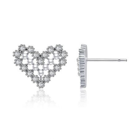 Side view of the heart-shaped pearl and CZ stud earring, highlighting its rhodium-plated finish.