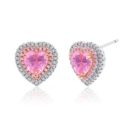 Angled shot of the heart-shaped earrings, displaying the brilliant sparkle of the pink and clear cubic zirconia stones.