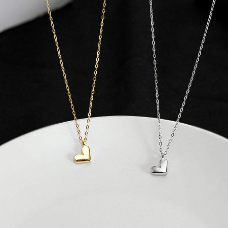 925 Sterling Silver Minimalist Heart Shape Necklace (Set of 5) - A set of minimalist heart-shaped necklaces in both 925 sterling silver and gold finishes, displayed side-by-side.