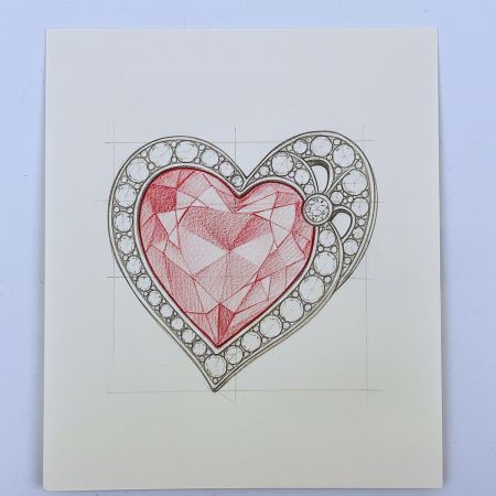 The original design sketch of the heart brooch, showing the creative process from concept to reality