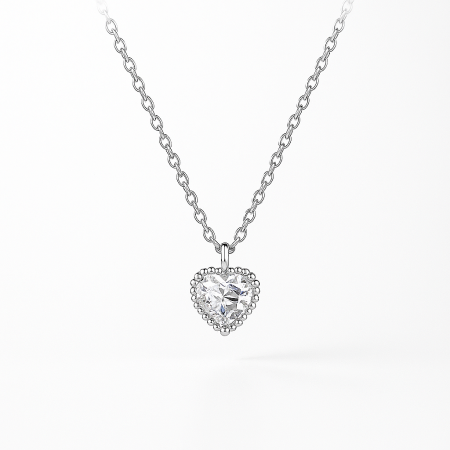 Delicate sterling silver heart-shaped pendant necklace with sparkling crystals.